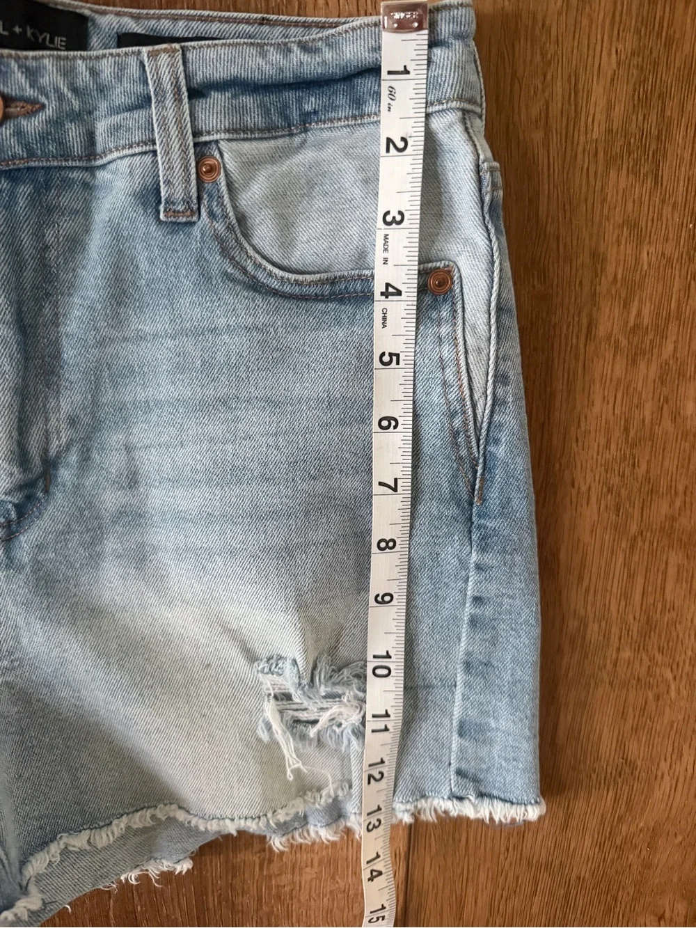 light wash distressed denim shorts